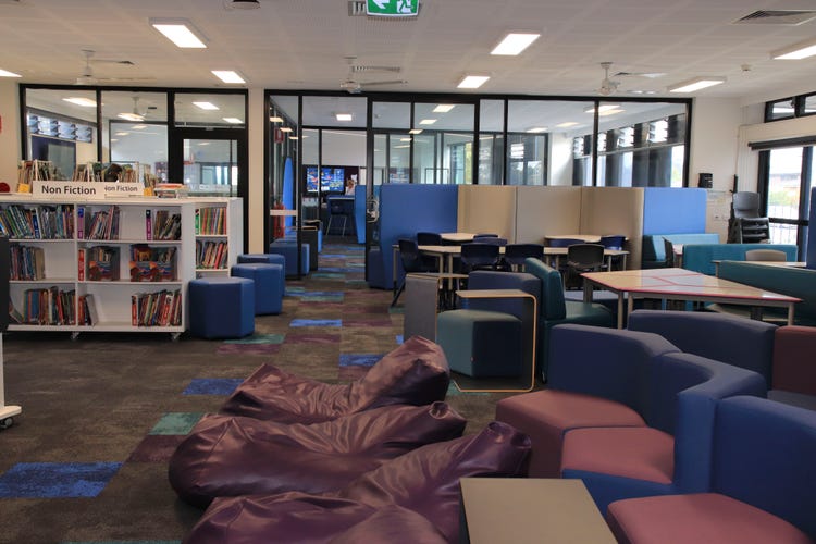 School library with colourful seating and bookshelves