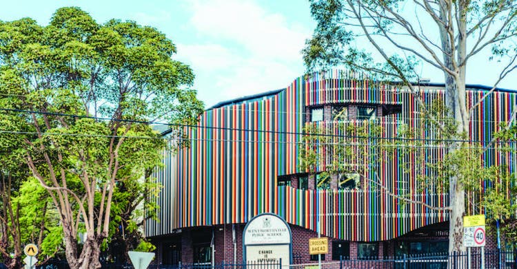 Colourful school building and school entrance