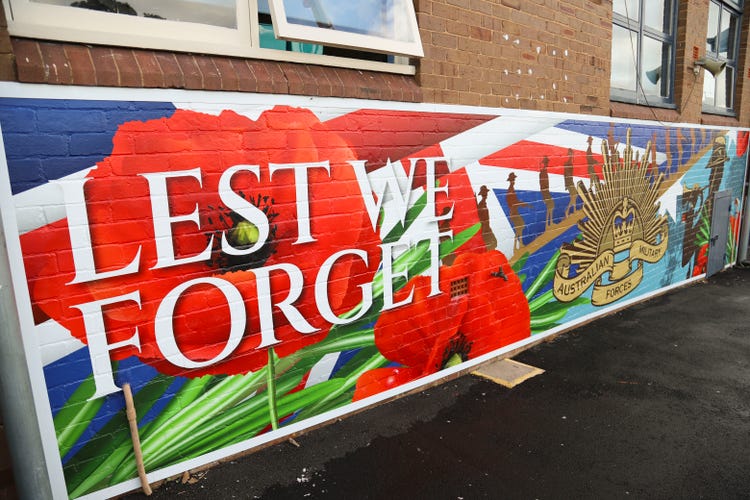 Lest We Forget mural on school wall