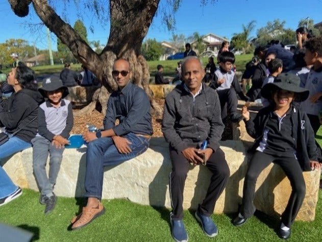 students and parents at outdoor event